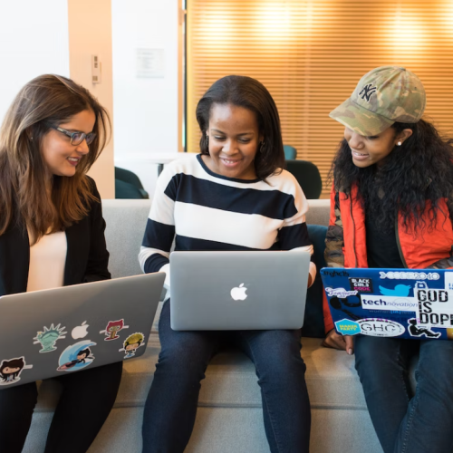 three-women-sitting-on-sofa-with-MacBook-photo-–-Free-Ux-designer-Image-on-Unsplash